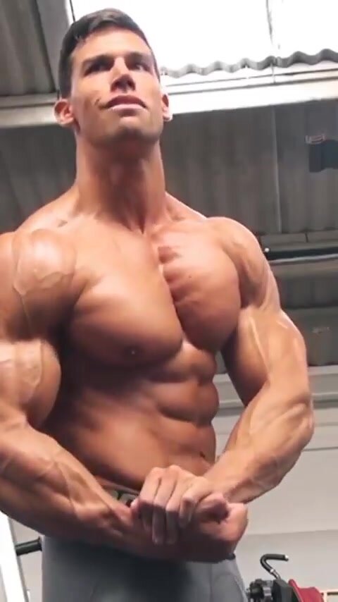 giant chad muscle flex in gym
