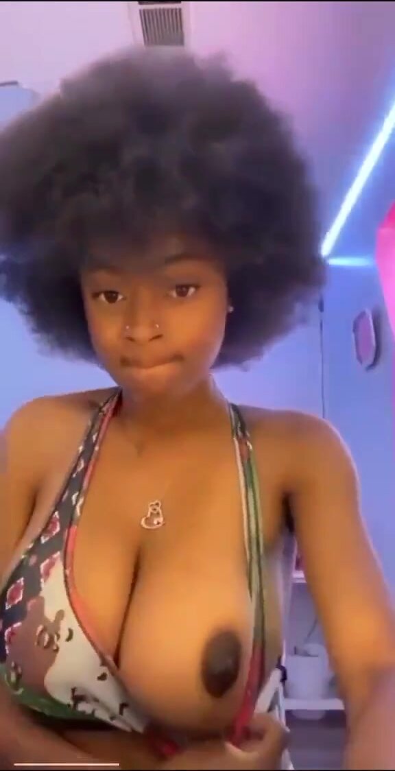 Young pretty ebony shows large titties
