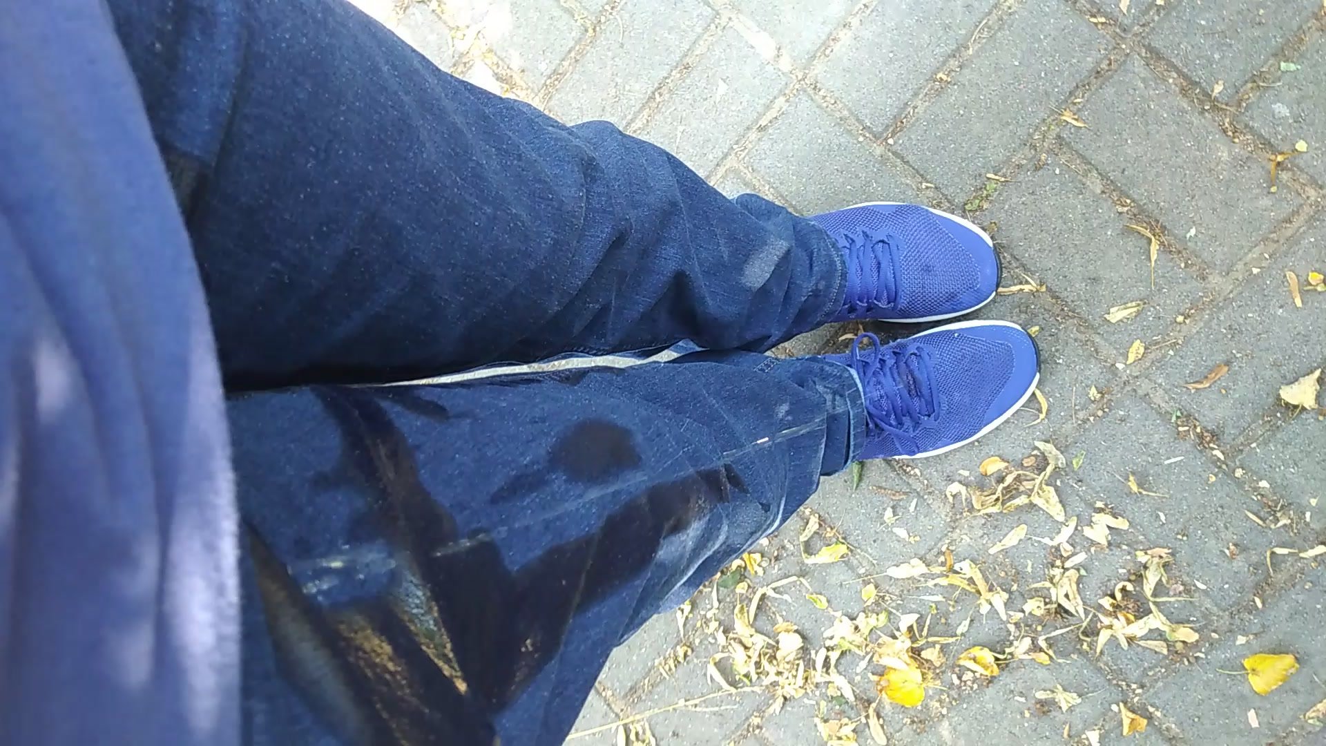Public soaking in jeans and Nikes