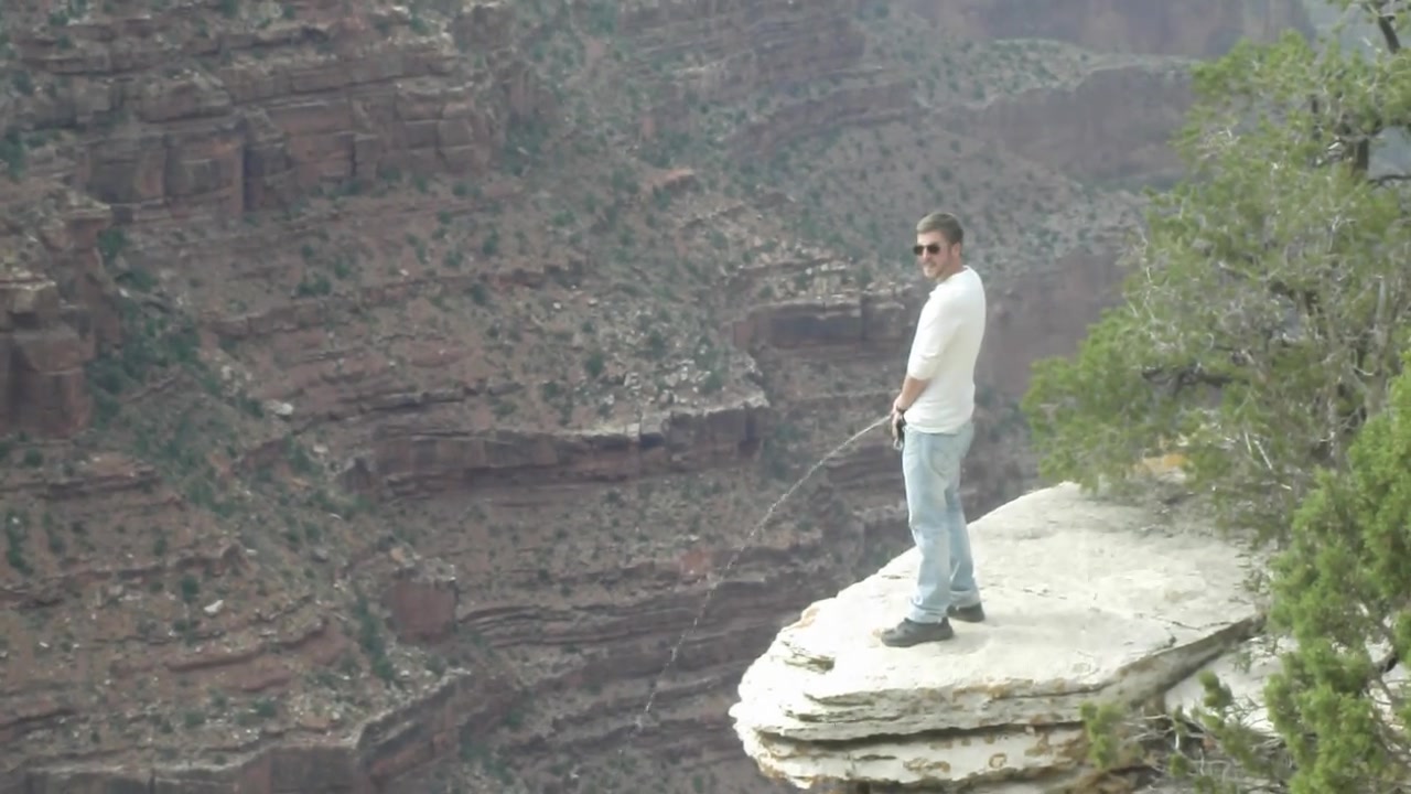 Thick cock pissing into the grand canyon