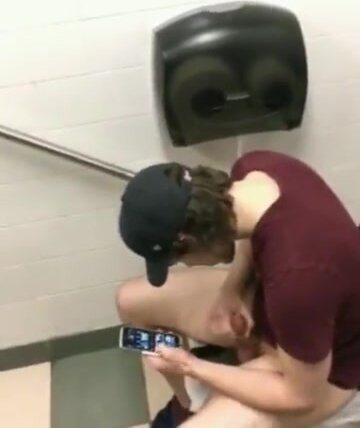 Guy caught in college bathrooms Jerking Off