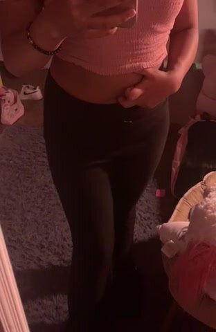 Belly button fingering in yoga pants