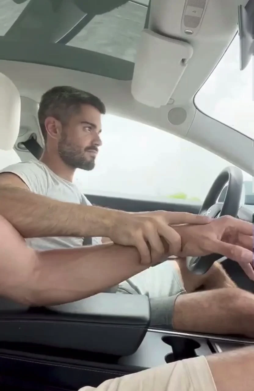 Car sex getting a handjob while driving his photo