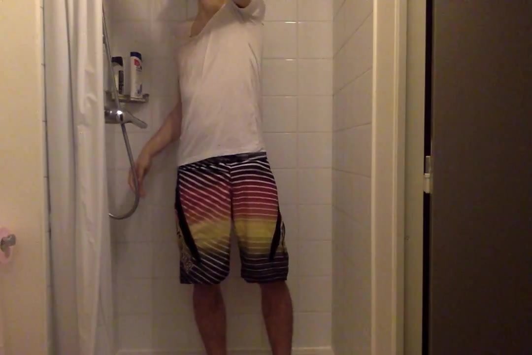 Sexy guy teases in the shower
