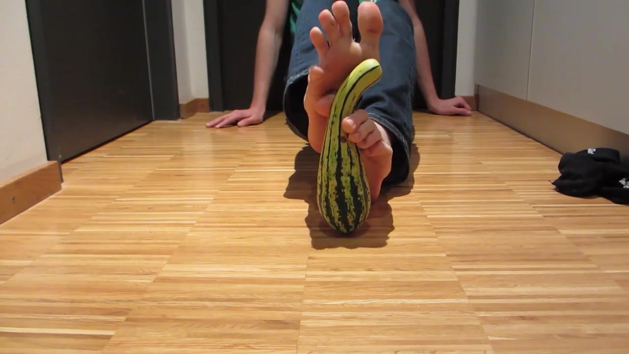 Sexy male feet tease a pumpkin