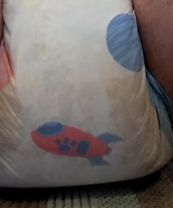 Sitting and Squishing in Messy Diaper