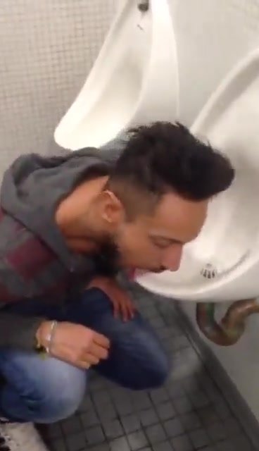 Faggot licking urinal - video 2