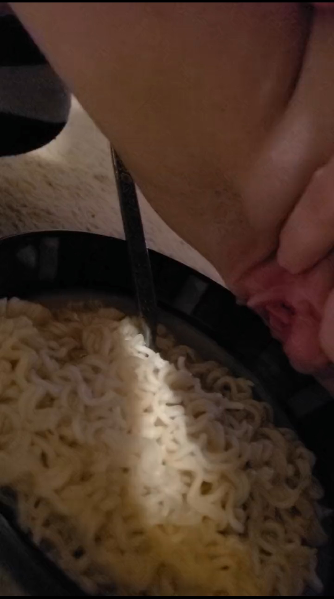 Girl peeing in noodles