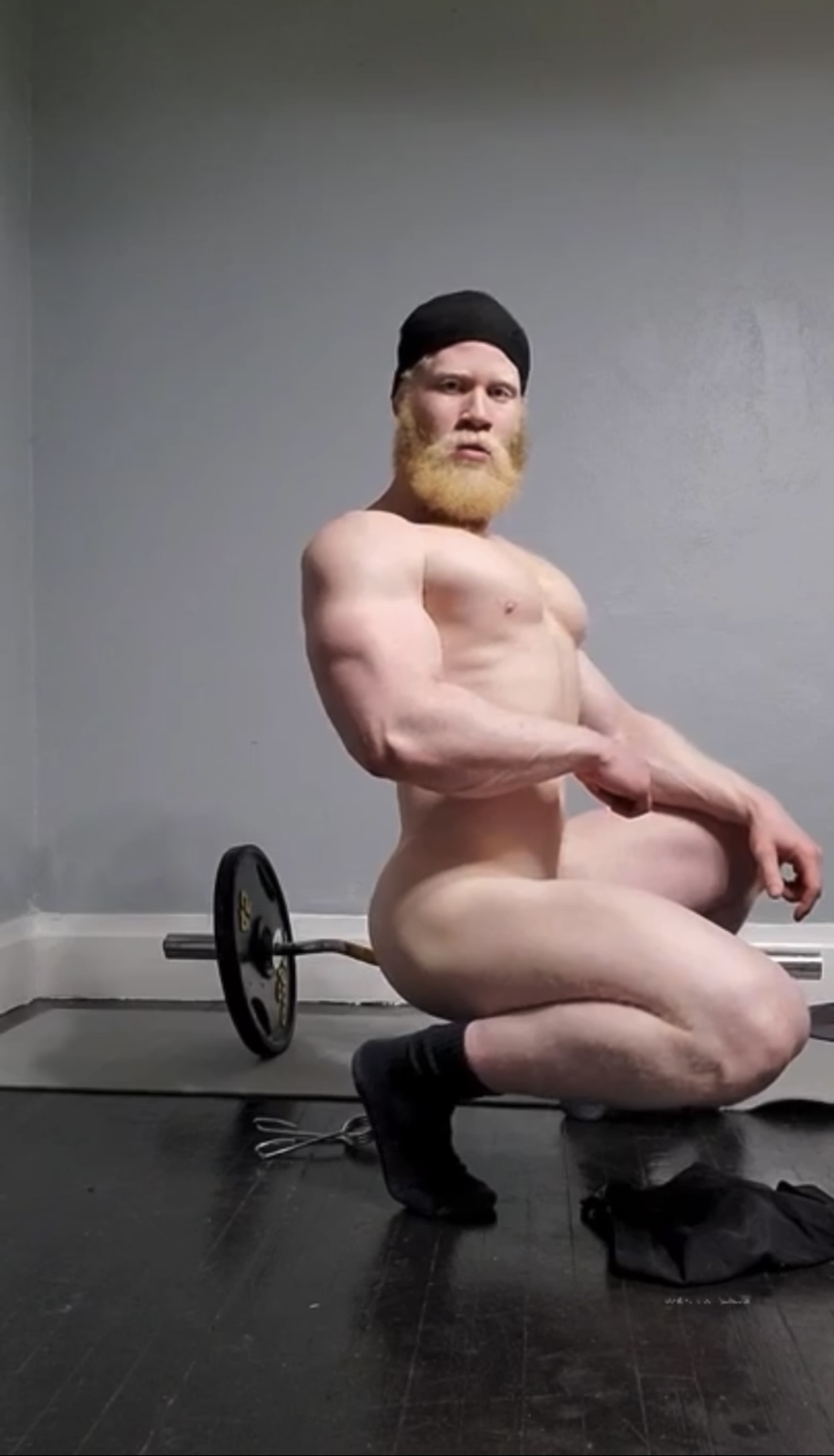 Muscular Albino bull works out naked
