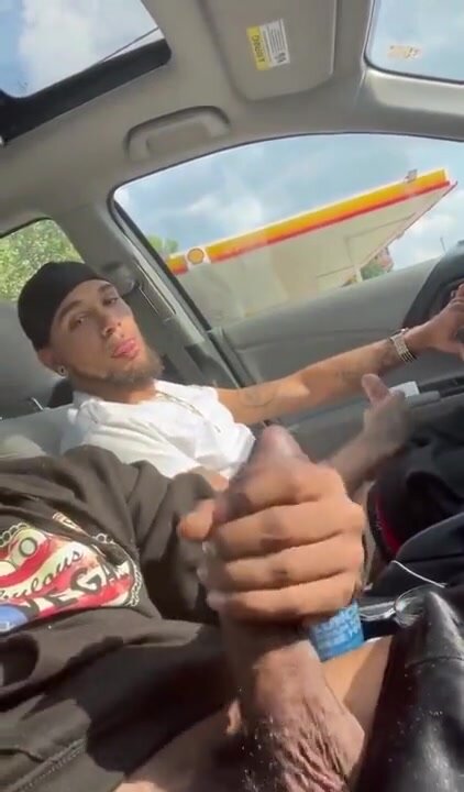 Cleaning his cock in the car