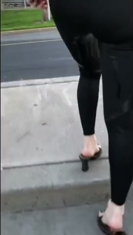 Woman pissing in public