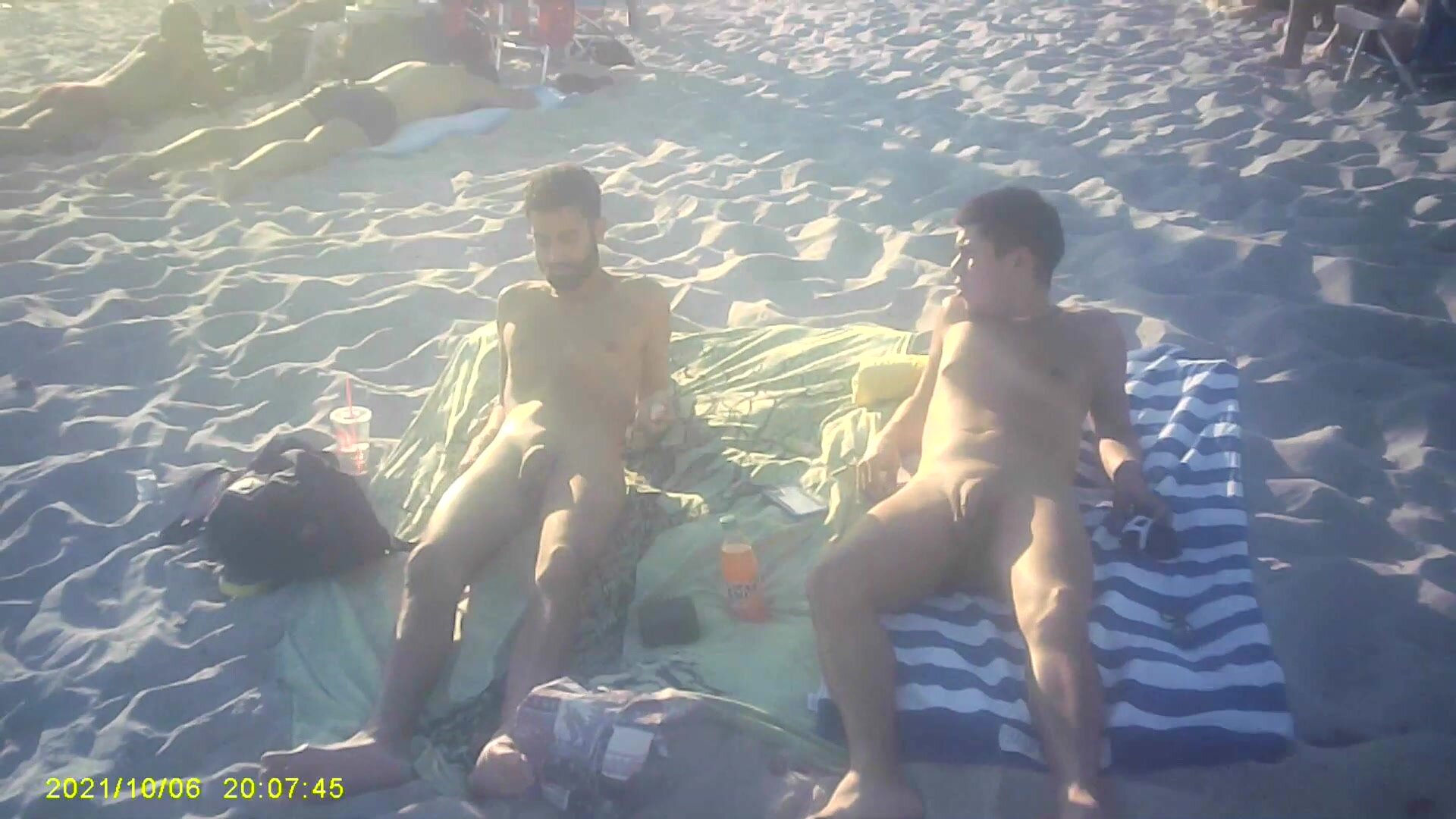 Naked gay beach couple