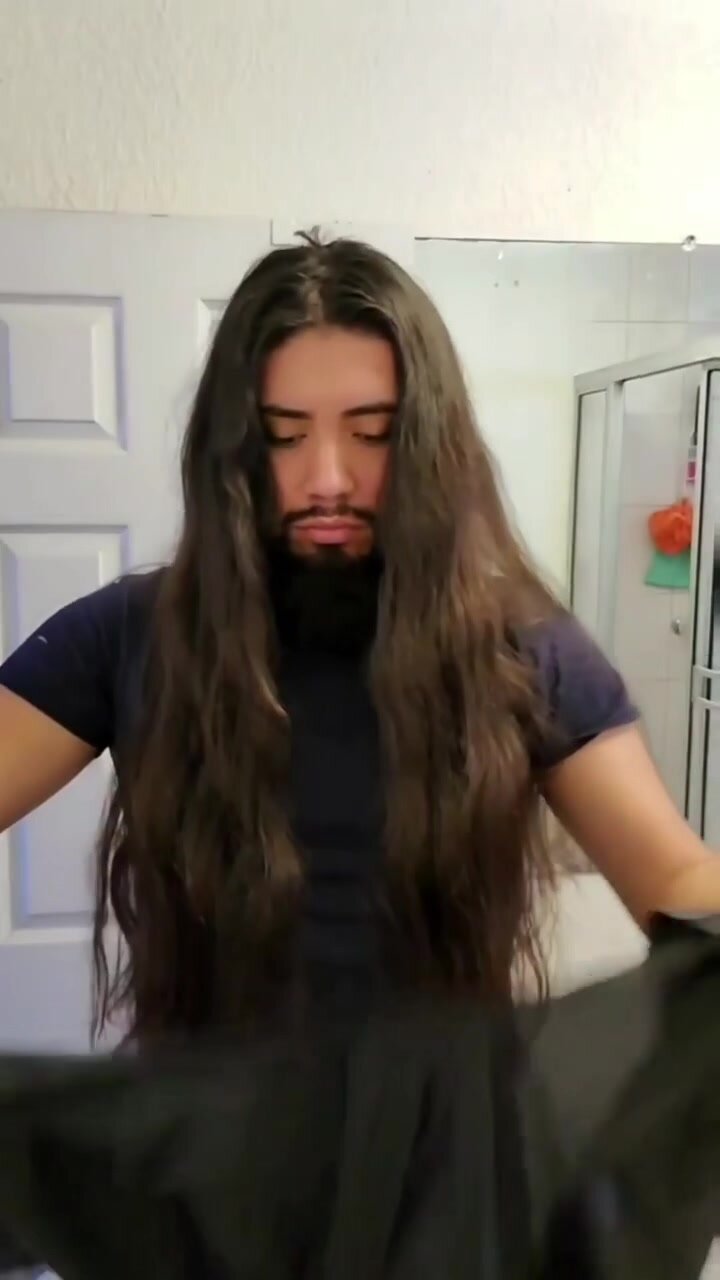 Long haired guy cuts his hair (only hair cut) - video 3