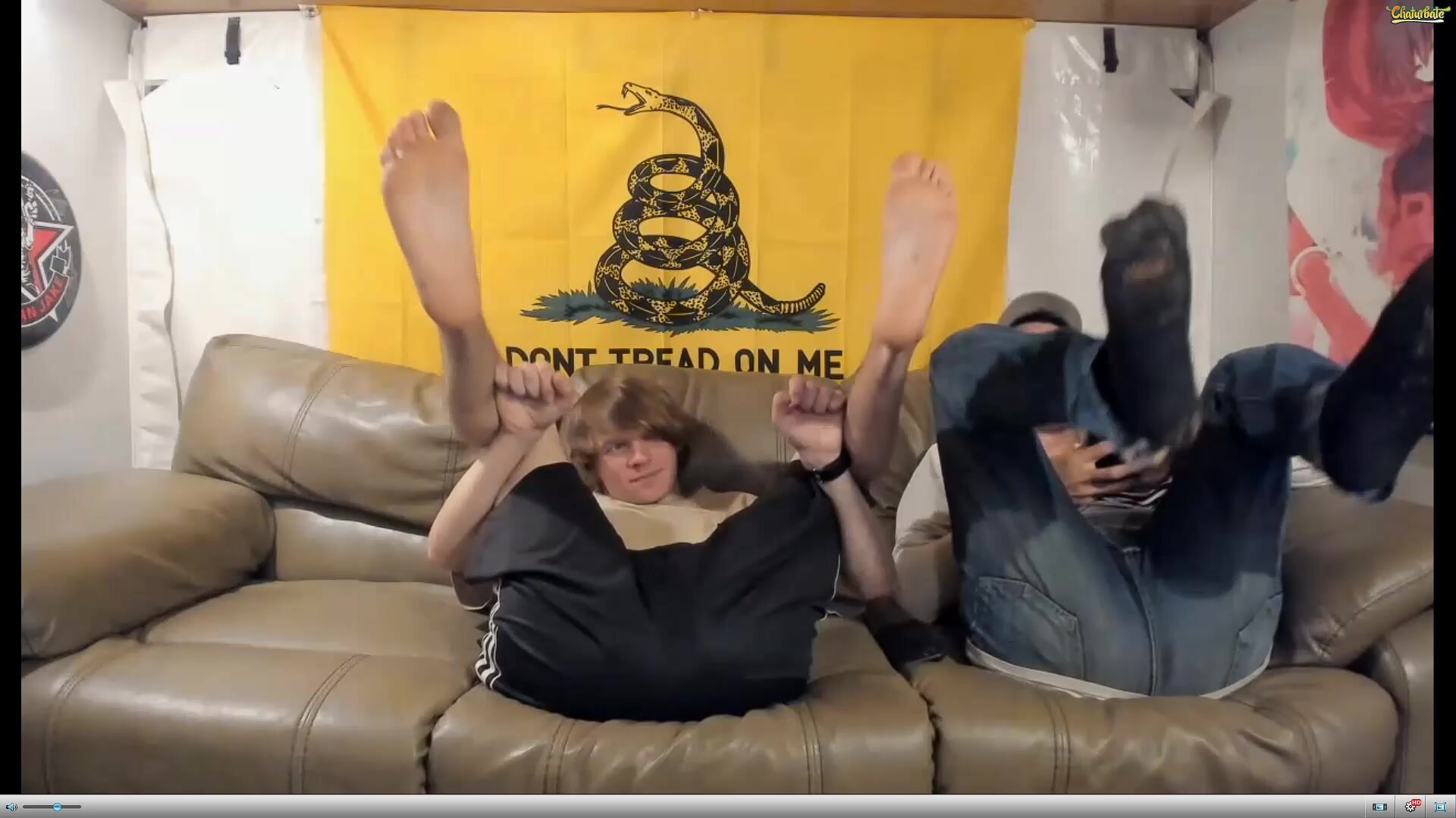 two friends showing feet