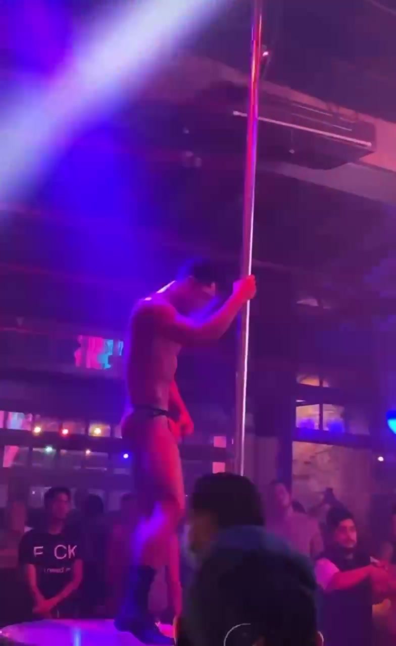 Mexican gogo boy on the pole