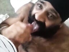 Sikh cocksucker guzzles cum