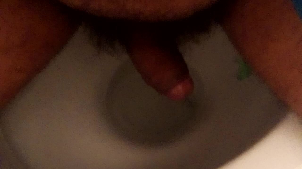 Holding piss sitting on toilet