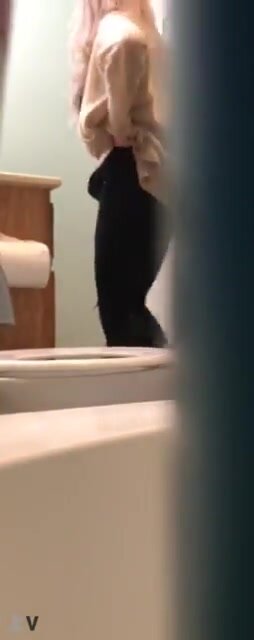 Hidden cam catches young teen peeing and wiping