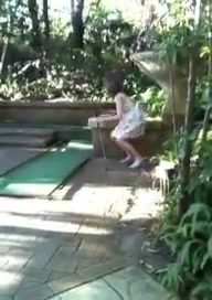 Lady Pees To The Side Of Minigolf