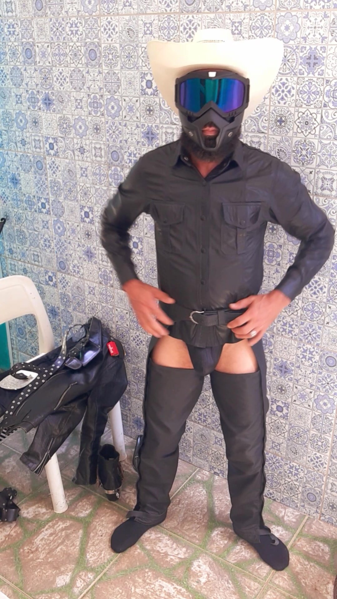 Cowboy wearing all his leather