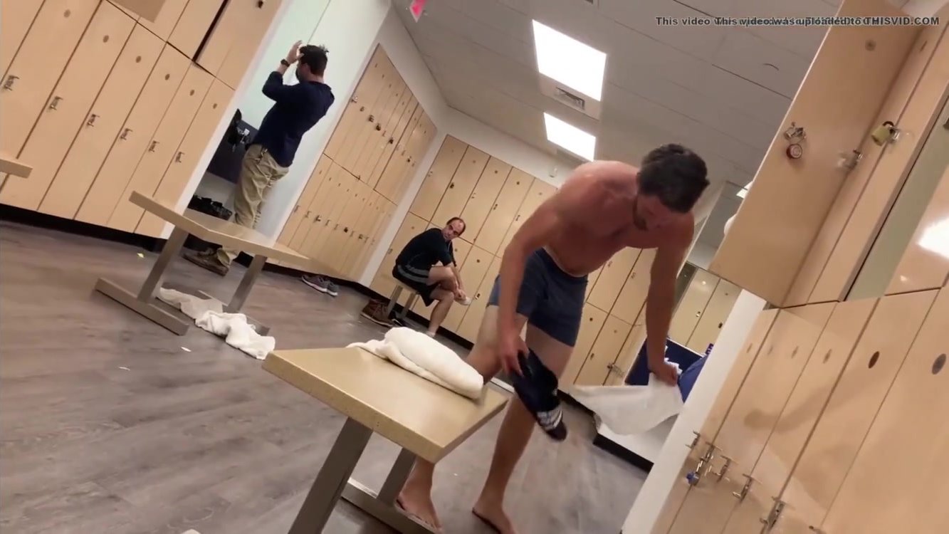 Spy cute guy changing room