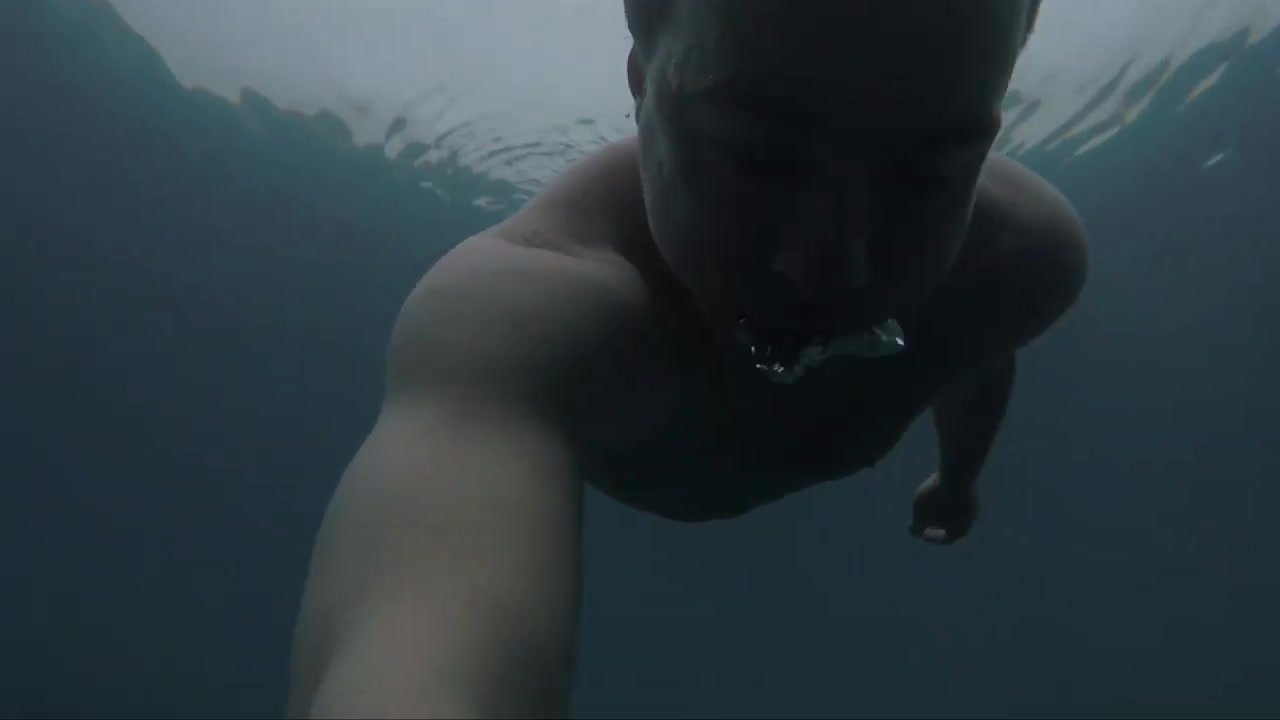 Freediving barefaced underwater in sunken forest