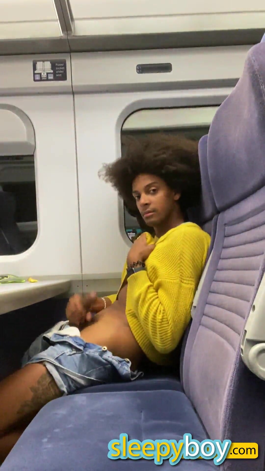 Cute black guy cumming on a train