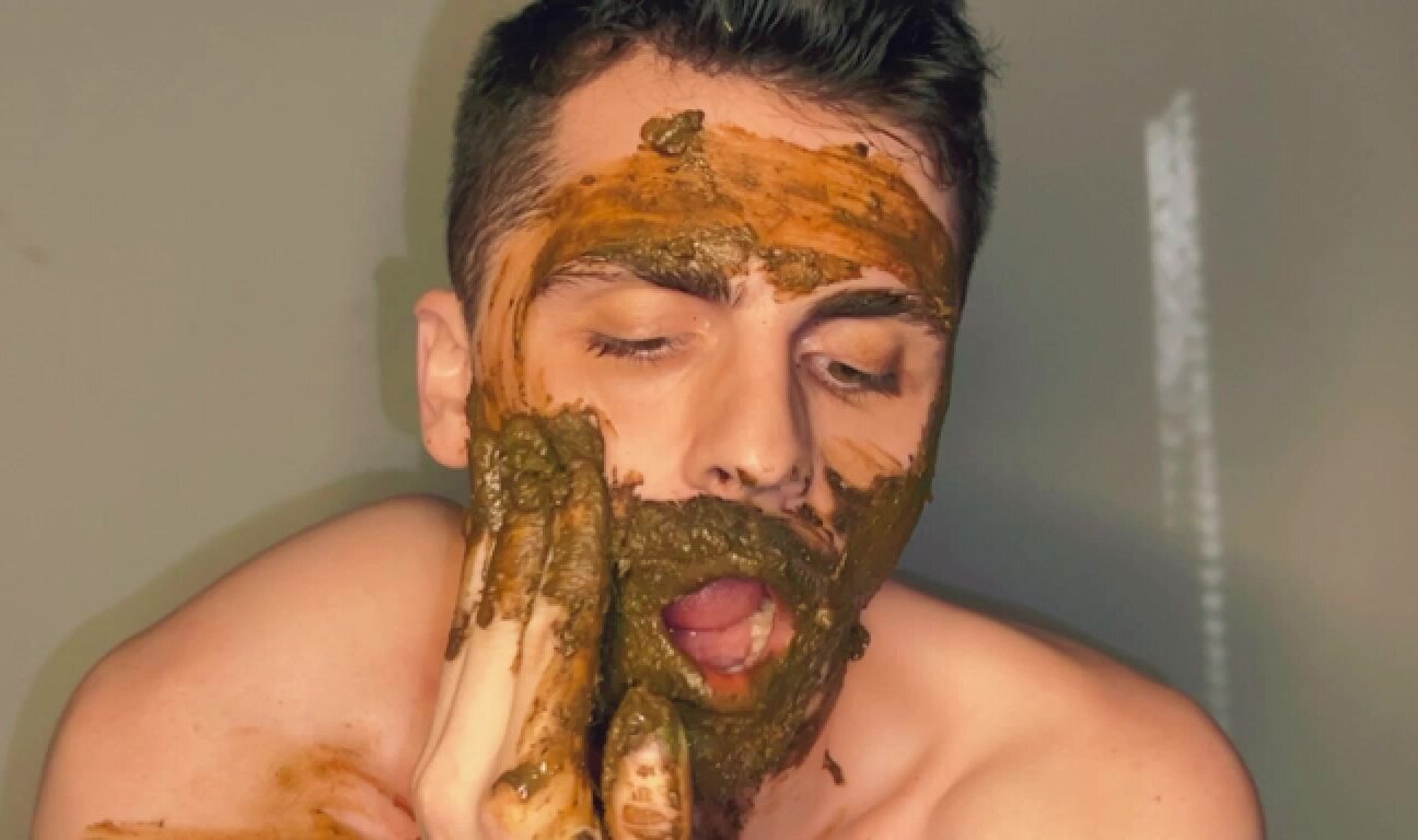 Boy covering entire face and body in his shit