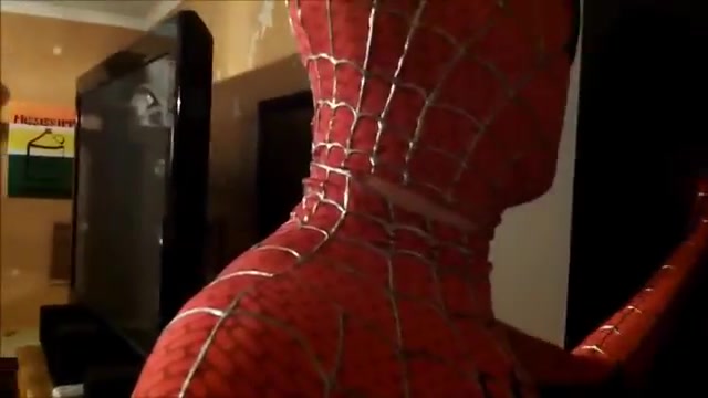 Spider Man put biker suit