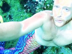 Underwater barefaced redhead merman - video 3