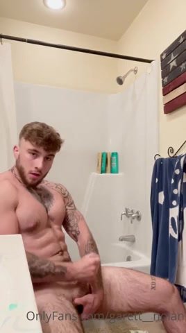 Fit ginger has a nice naked wank in the bathroom