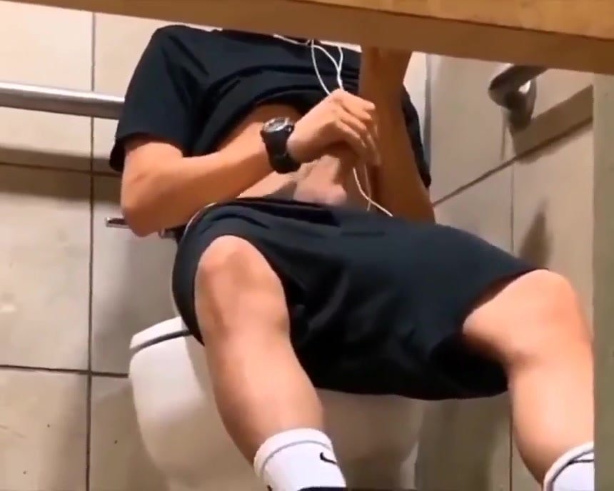 Twink is caught wanking and cumming in toilet