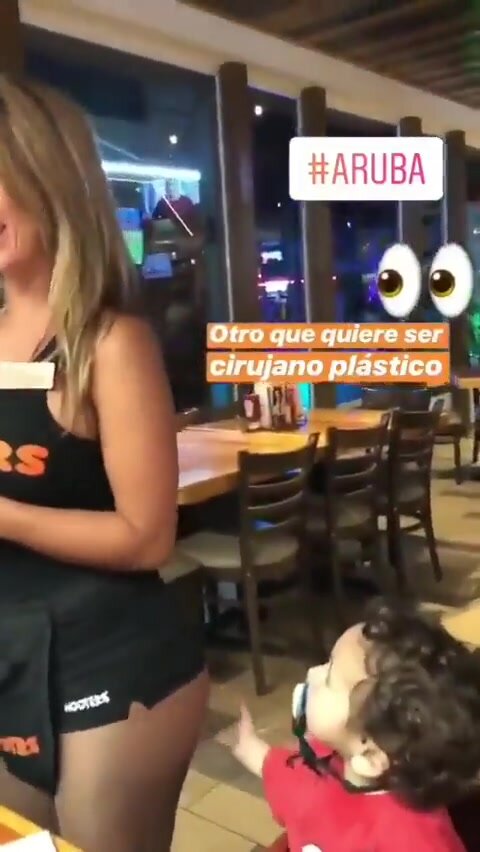 Hooters babe gets inturuped taking an order