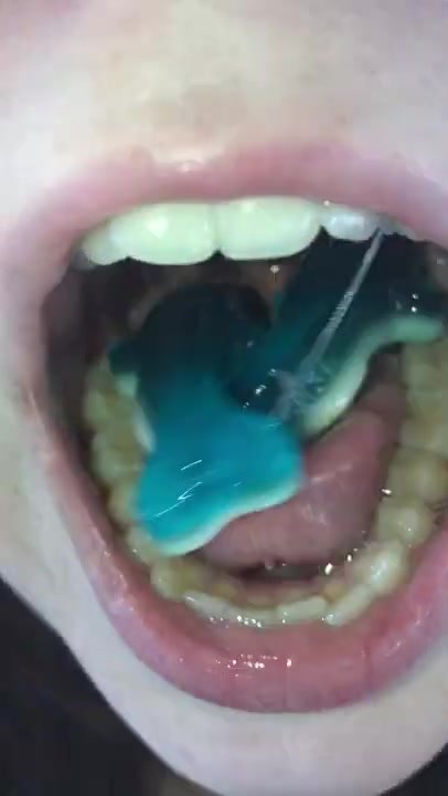 Open mouth gummy swallow - video 2