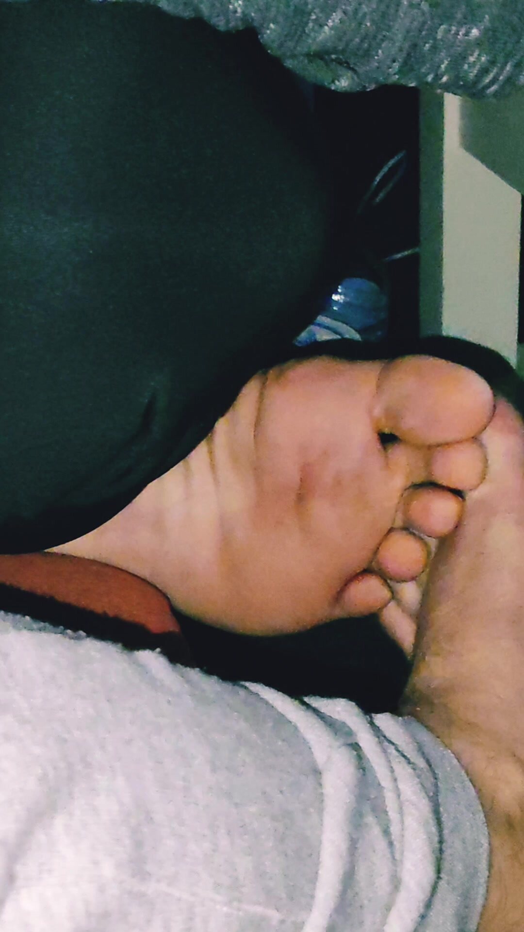 Friends (greek and arab) rubbing soles