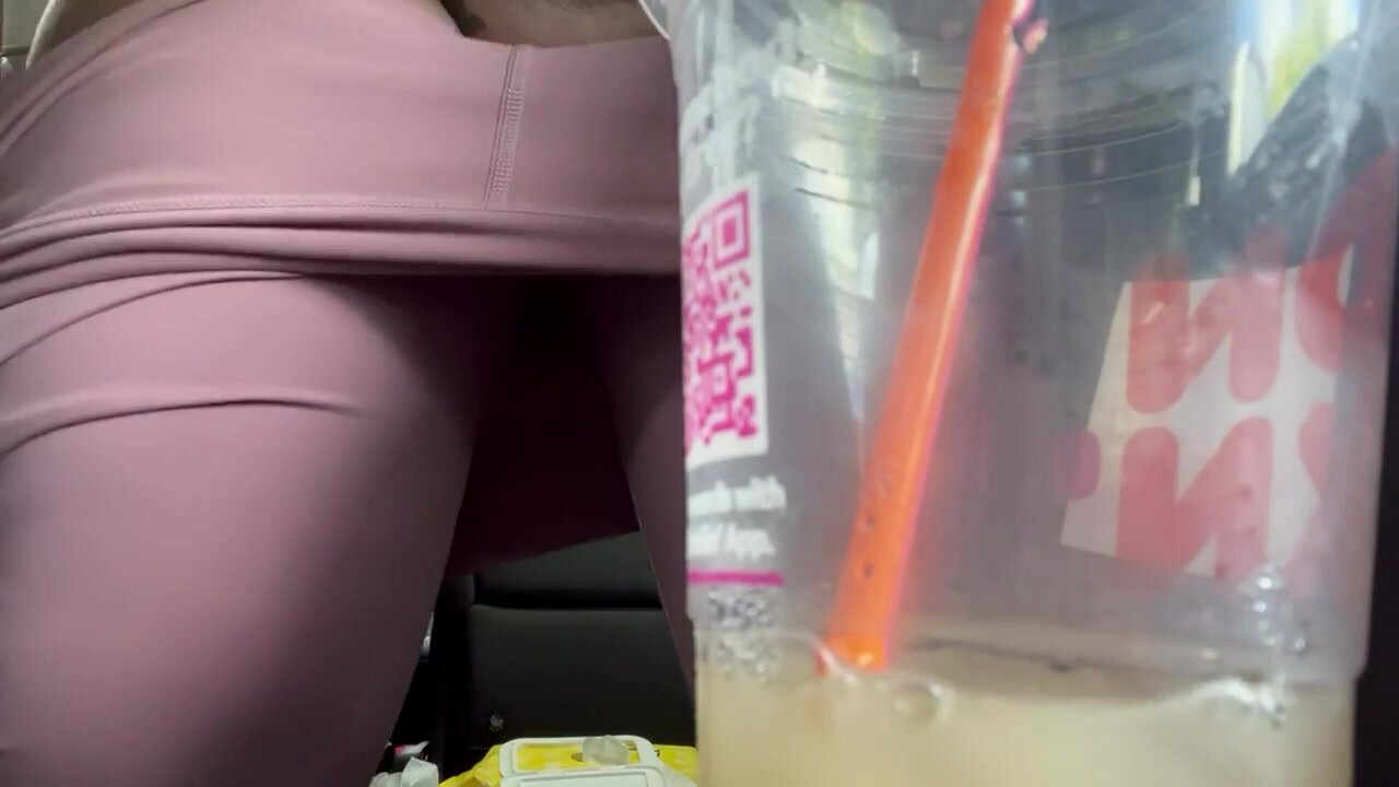 Desperately peeing in a DD cup in car