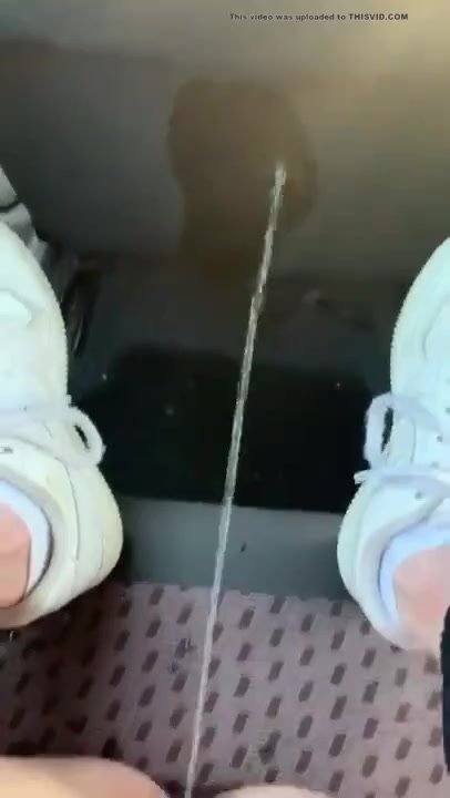 pissing on the back seat of her car
