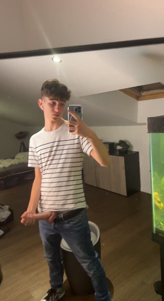 Horny cute twink wanking his big cock in his room