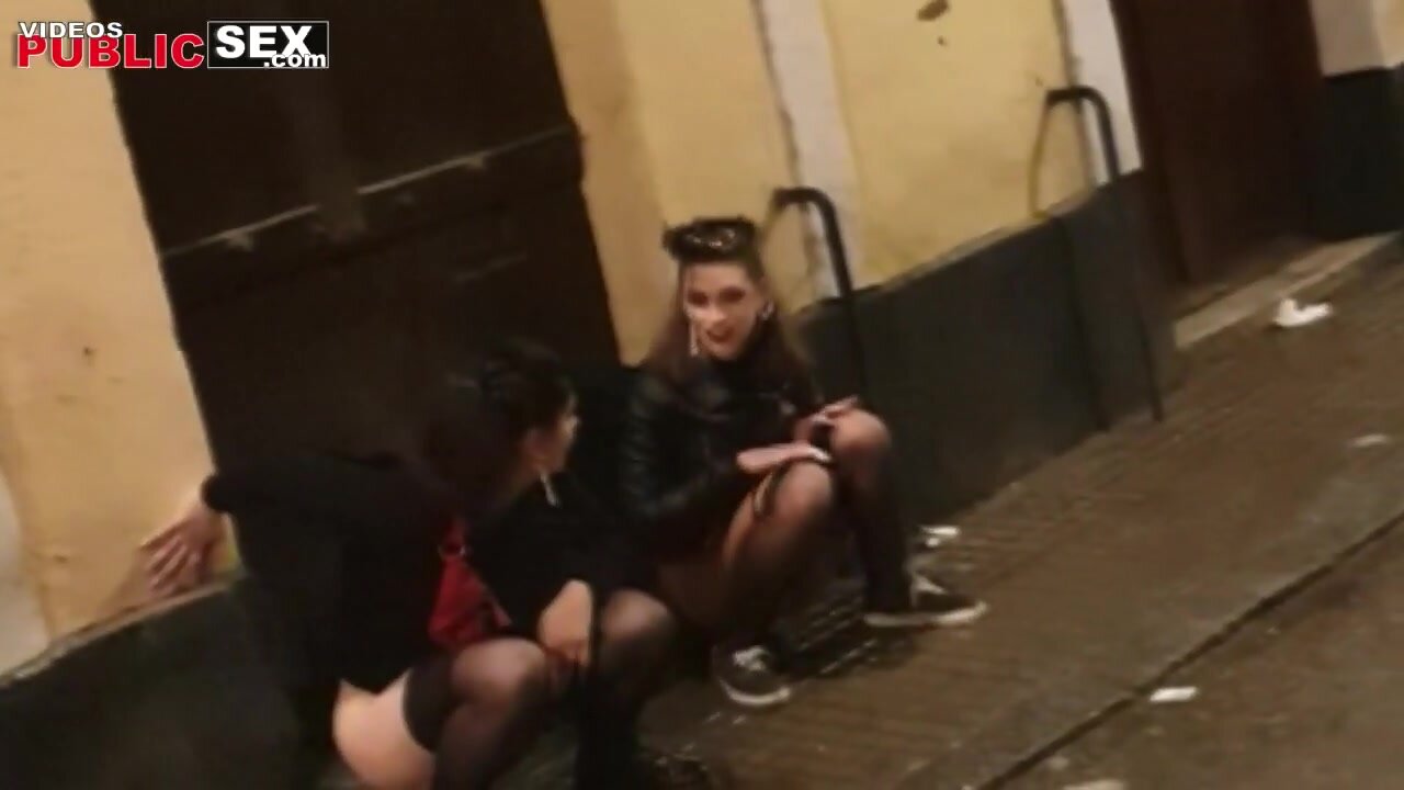 girls pee on sidewalk
