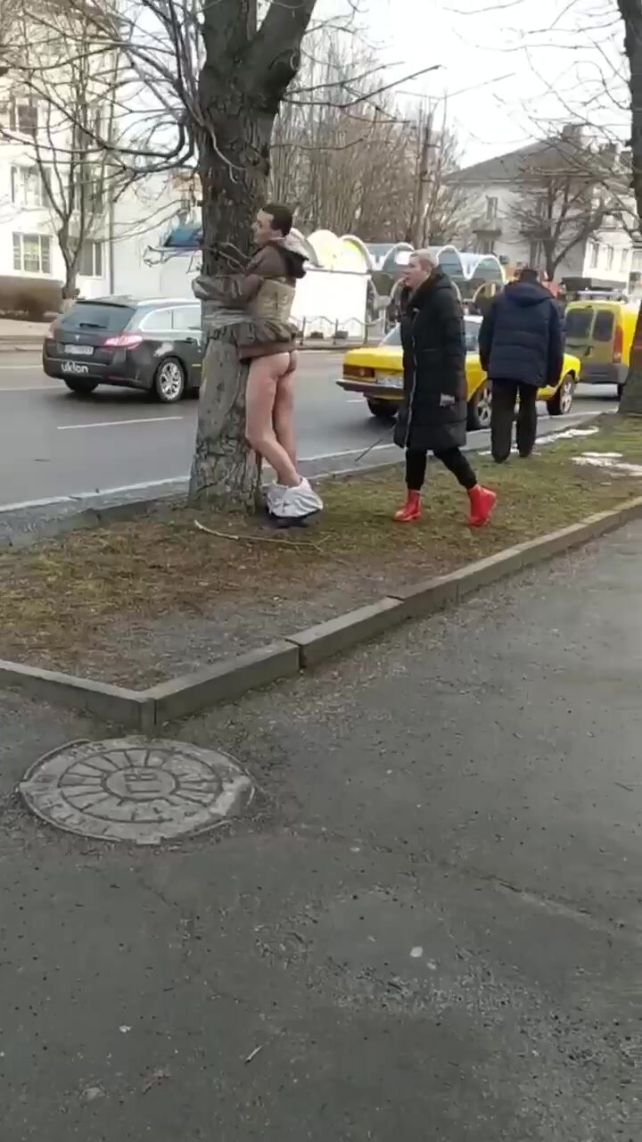 Ukranian looter tied to a tree and.