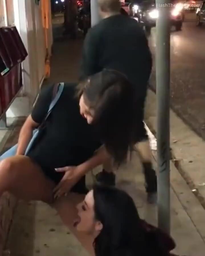 Girl pisses standing on the street,friend tastes n lick