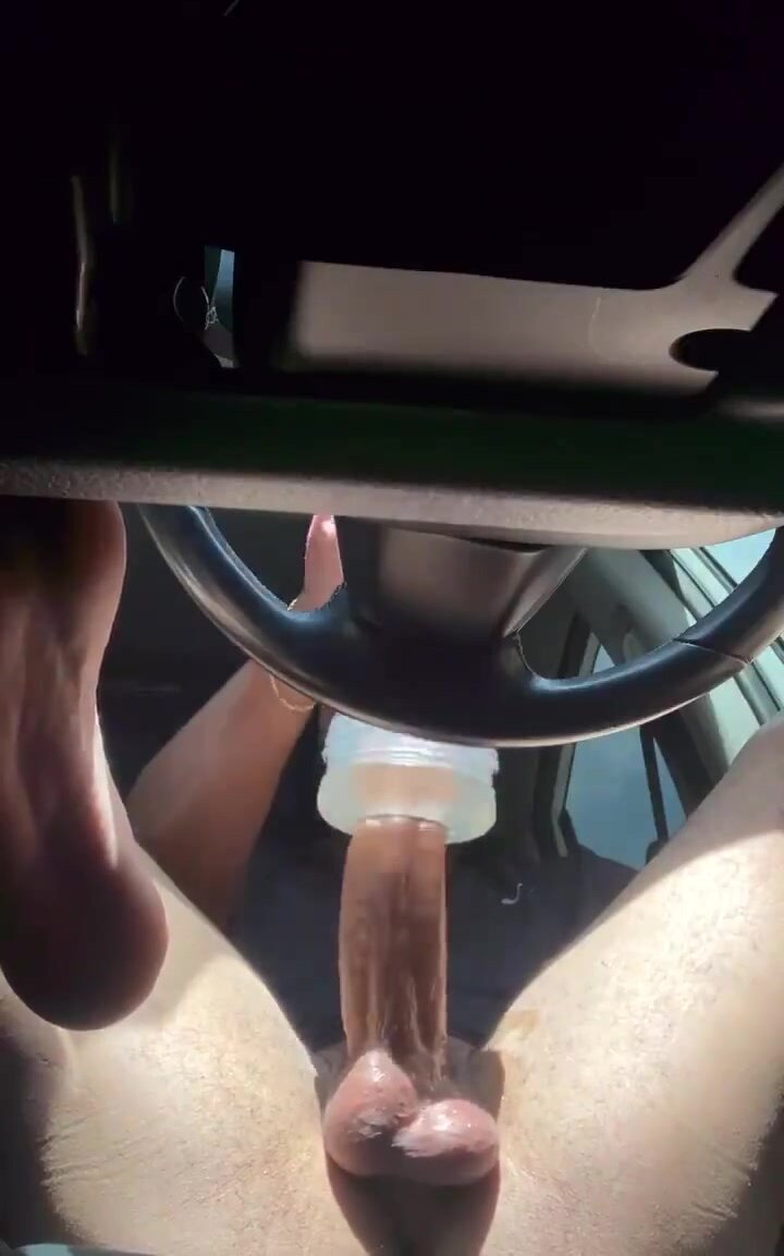Masturbating with a sex toy inside the car