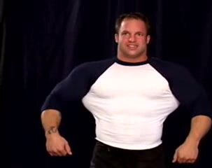 Bodybuilder  in tight T-shirt