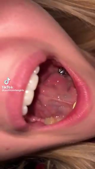 Hot blonde shows her uvula