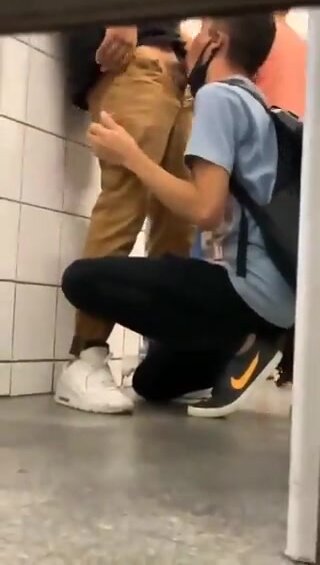 Student sucking a dick in a public toilet