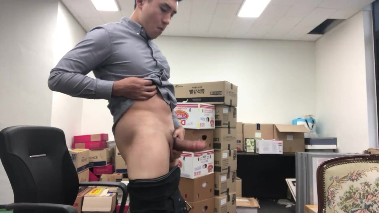 Asian office worker shows off his thick cock