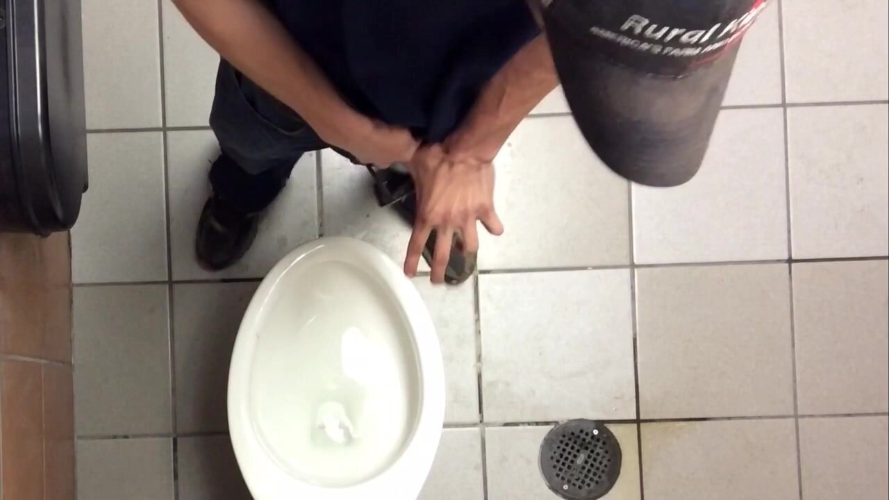 vintage men pissing at urinal 2
