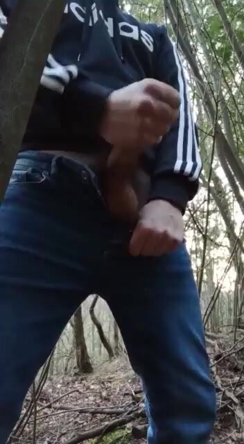 Adidas lad busts big load in the woods