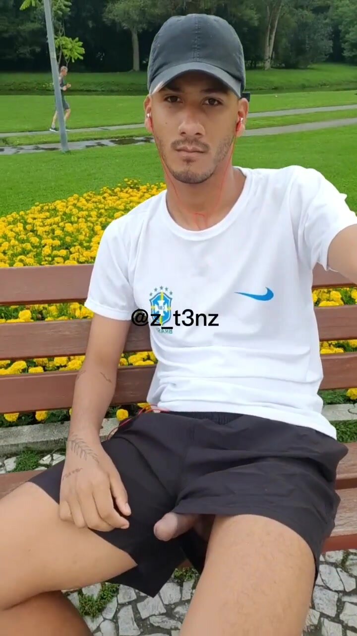 playing with his dick in a public park
