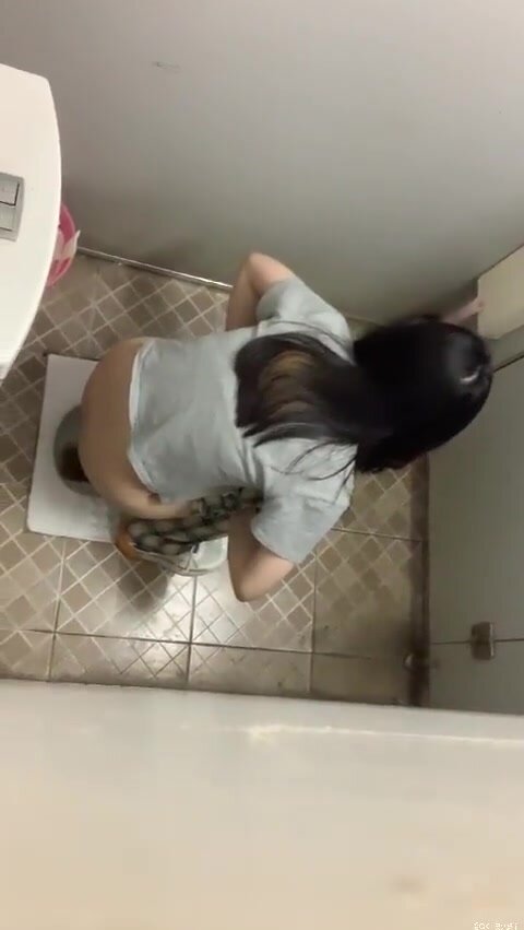 Over stall voyeur catches young Chinese teen squat piss